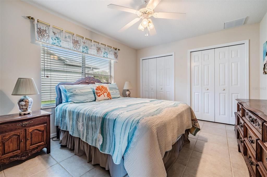 Bedroom 2 with dual, double door closets