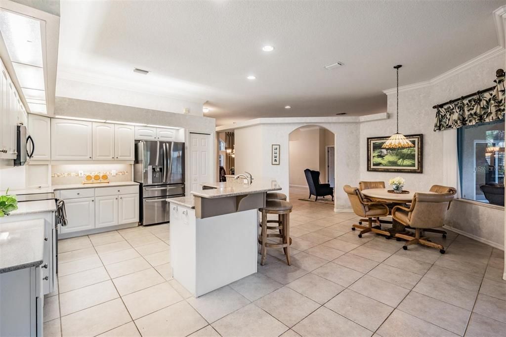 Eat-in area with arched doorways for a designer touch