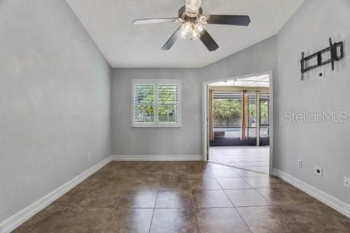 Primary bedroom opening out to patio