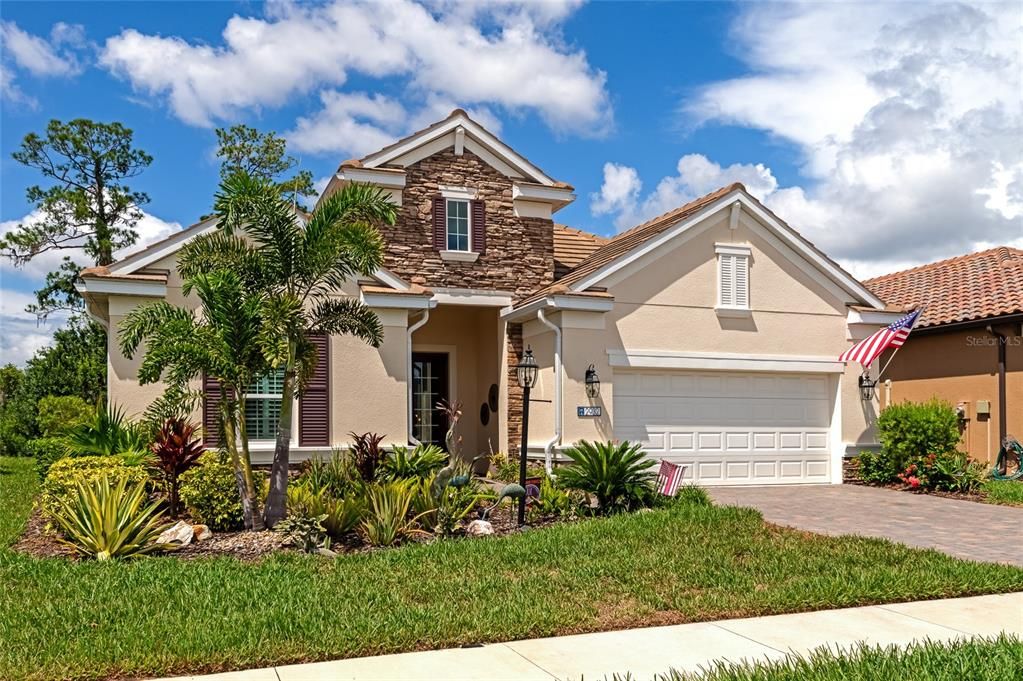 Brick paver driveway, tile roof,