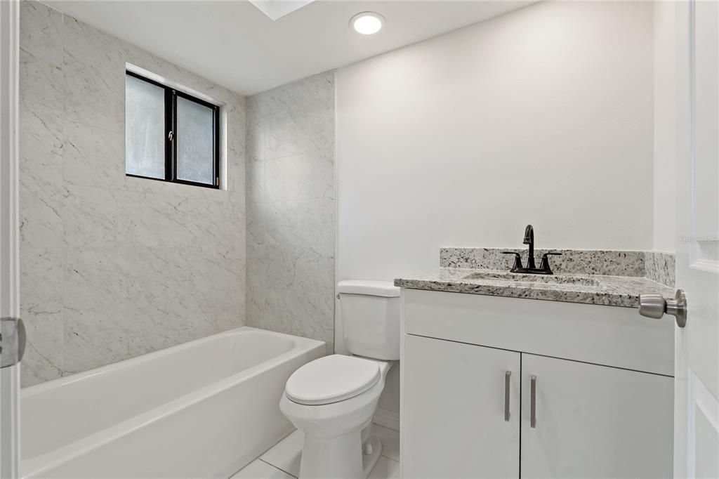 SOAKING TUB/SHOWER COMBO IN THE GUEST BATHROOM!