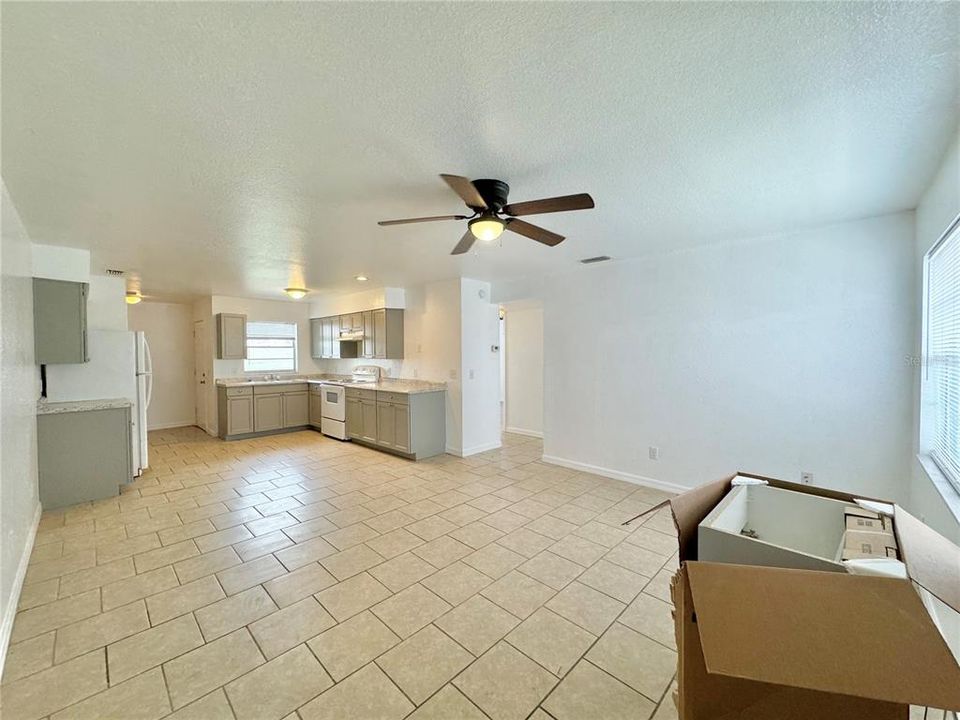 Open living room into kitchen