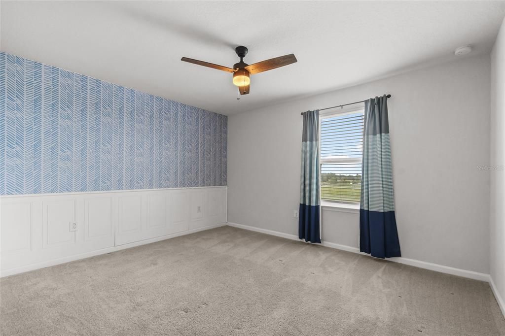 One of the upstairs bedrooms.