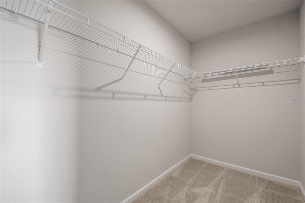 This is the walk in closet for one of the upstairs guest bedrooms!