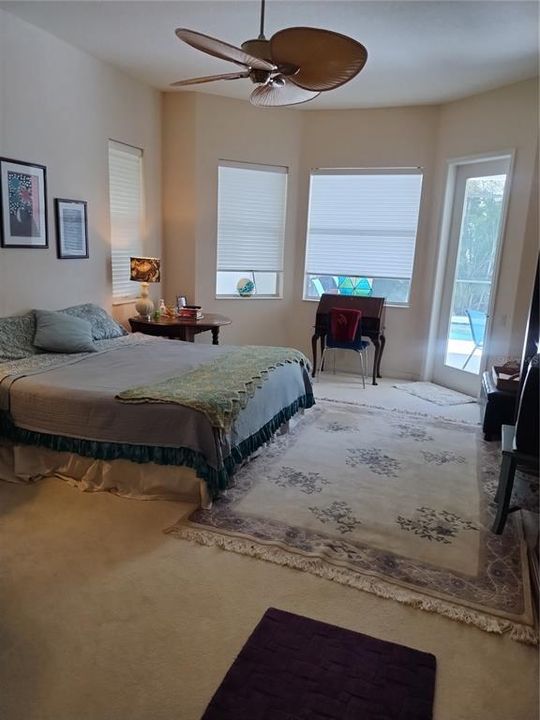 VERY LARGE MASTER BEDROOM WITH EXIT DOOR TO POOL