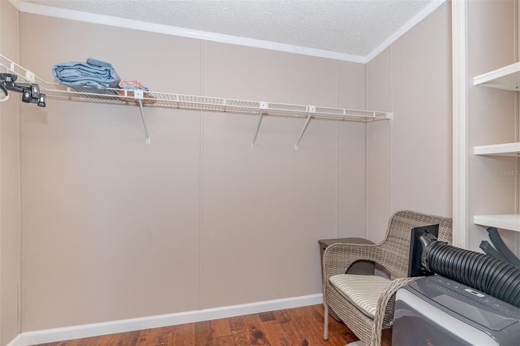 Large walk-in closet in primary bedroom, portable a/c unit does not convey at 6339 Partridge Ave. Englewood FL 34224