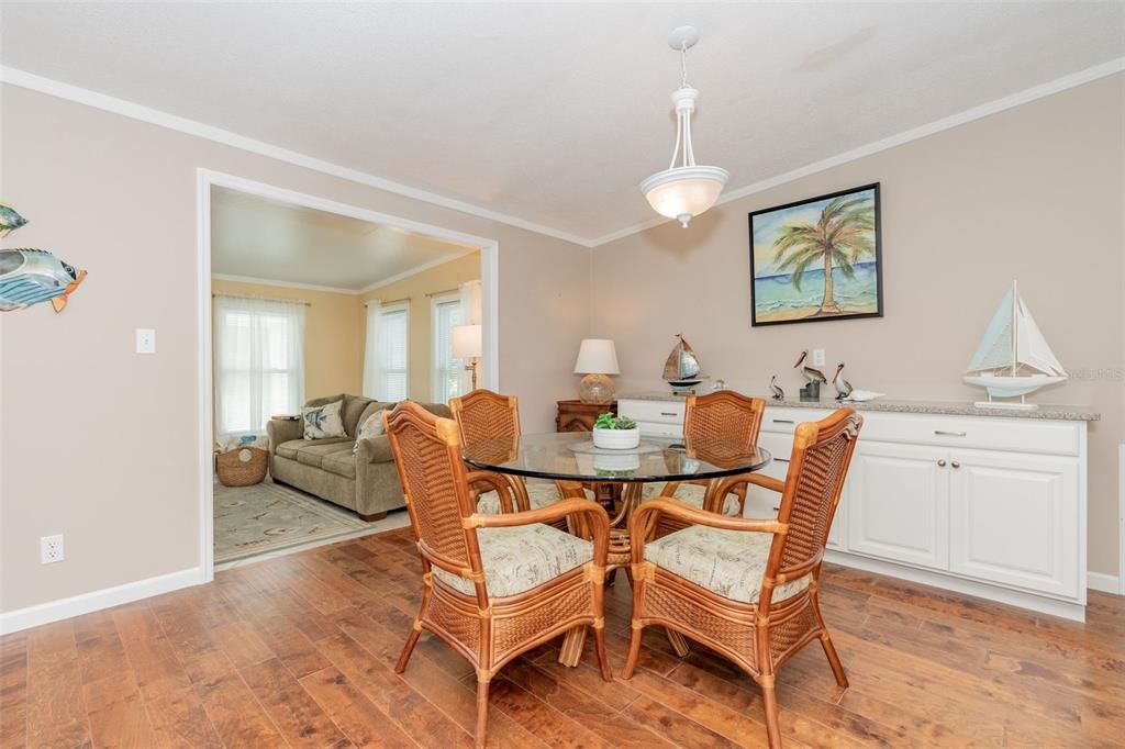 Dining room, nice longe buffet with granite countertop at 6339 Partridge Ave. Englewood FL 34224