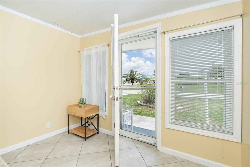 Separate front entry to the Florida room with tiled floors at 6339 Partridge Ave. Englewood FL 34224