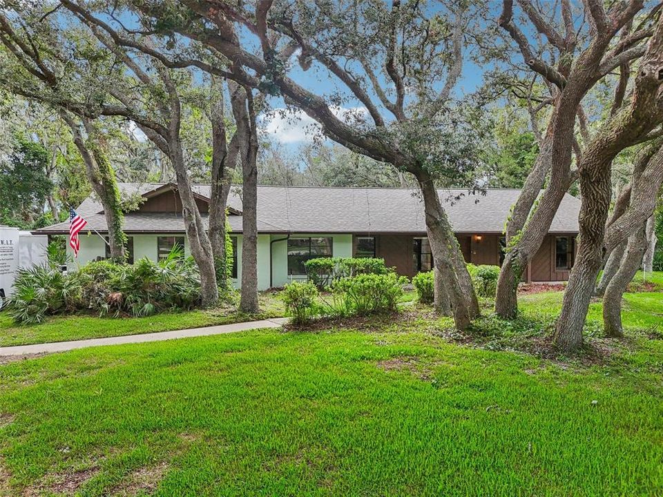 Tucked away on tree-lined streets this 3-bedroom, 2-bath POOL HOME sits on a huge .73 ACRE CUL-DE-SAC LOT with a NEWER ROOF (2019) and endless vintage charm you can embrace or bring your imagination and create the modern home of your dreams!