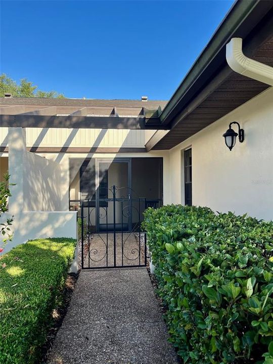 Gated front entry, a good spot for sitting with your dog!