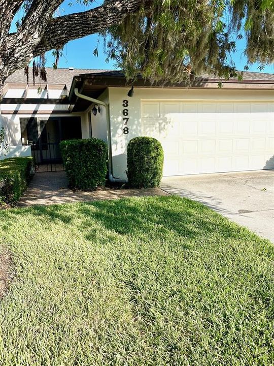 Private entry and garage door with touchpad access.