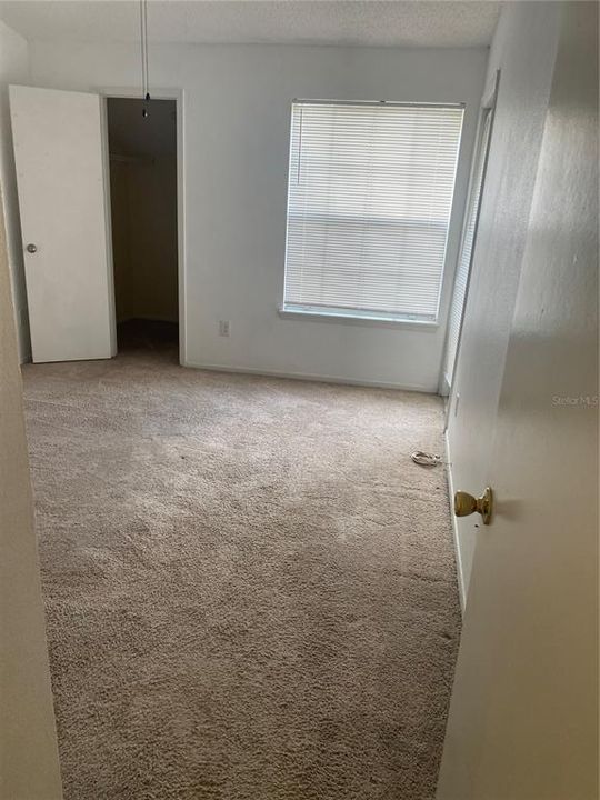 Bedroom and entrance to walking closet