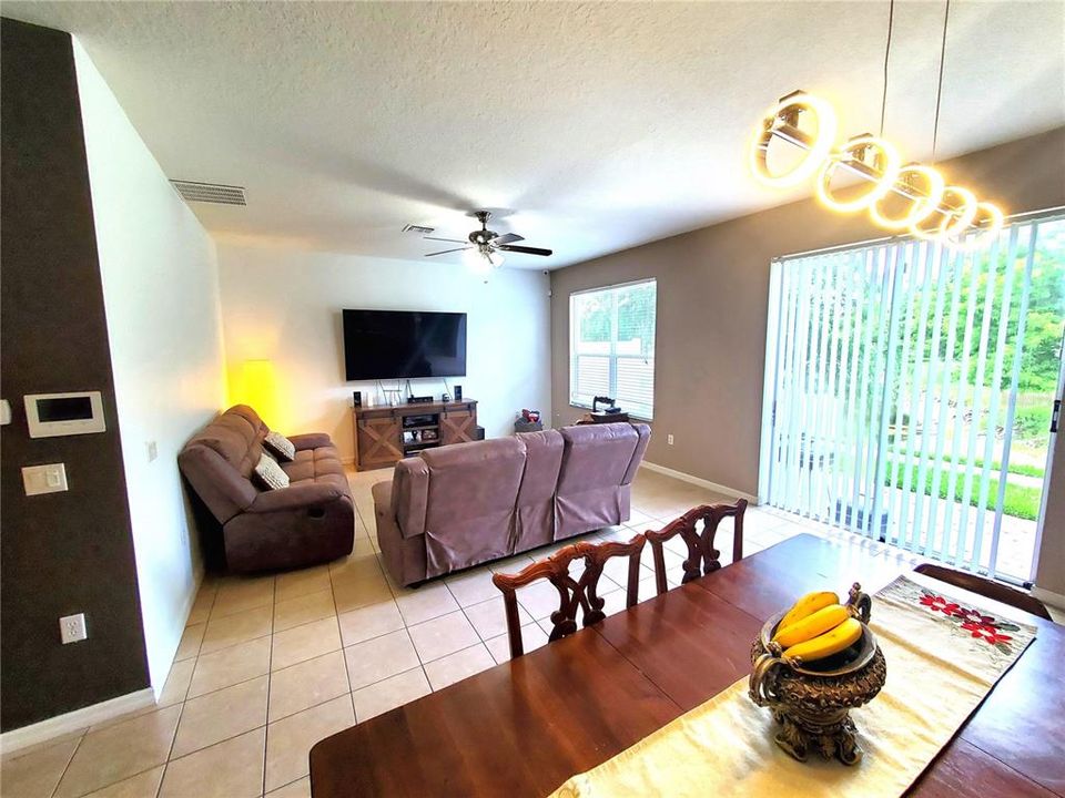 Thiis view is from the living room towards the eating area. Kitchen is in the background.