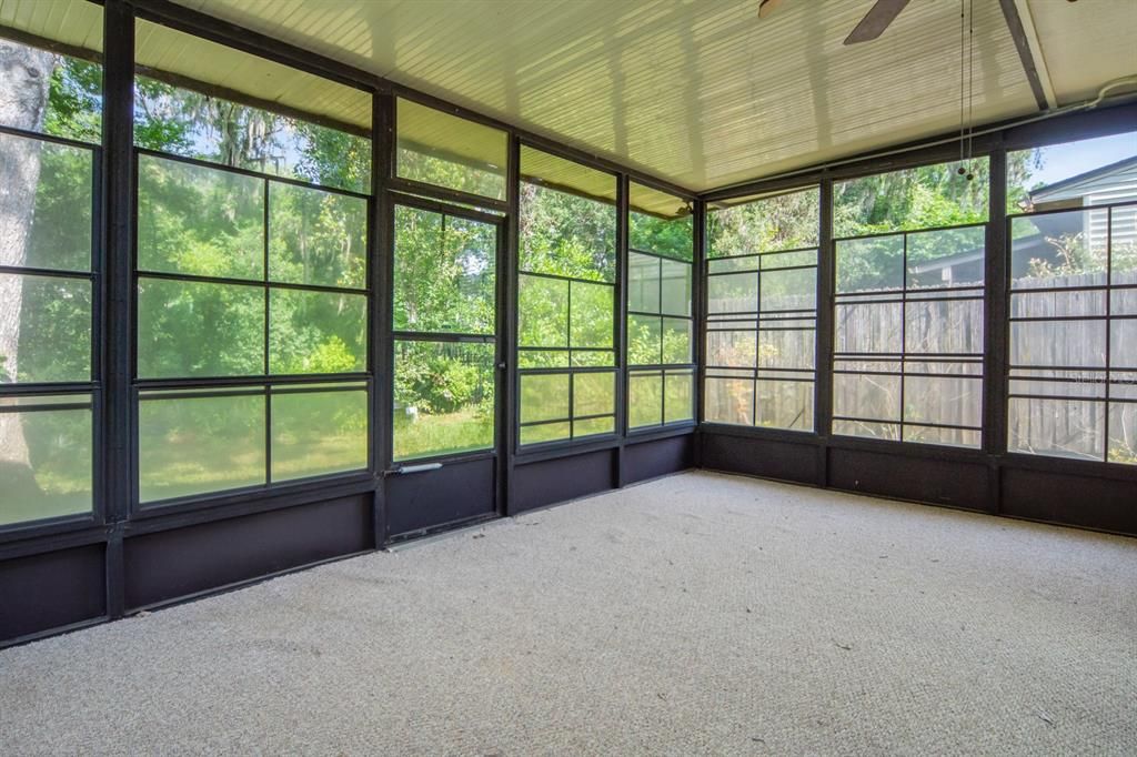 Screened in porch overlooking the creek