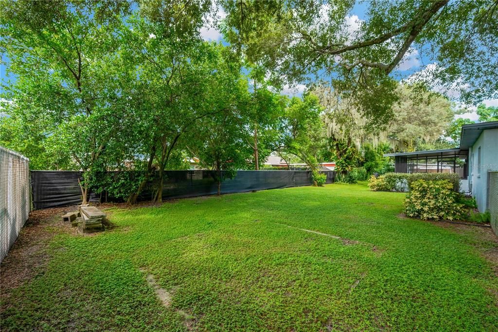 This oversized lot is completely fenced and has plenty of room for your green thumb or for your furry friend to enjoy.