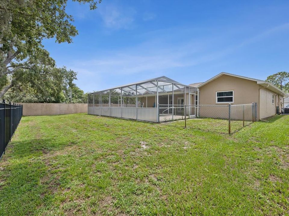 Small Enclosed Fence space perfect for small play area or dog run