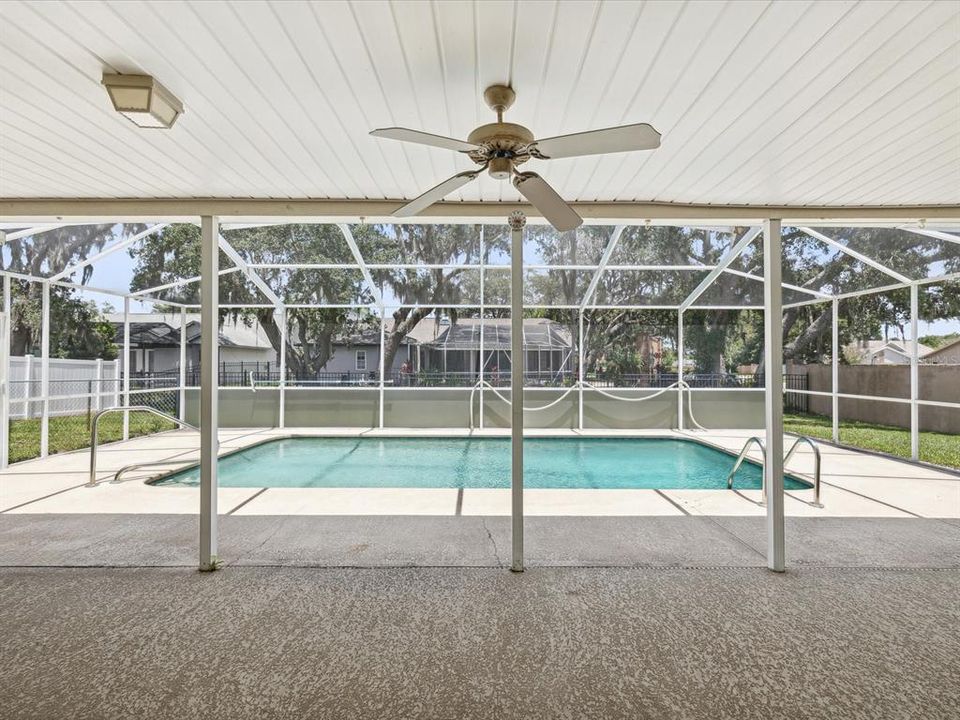 Covered and Screened entertaining and outdoor dining area!