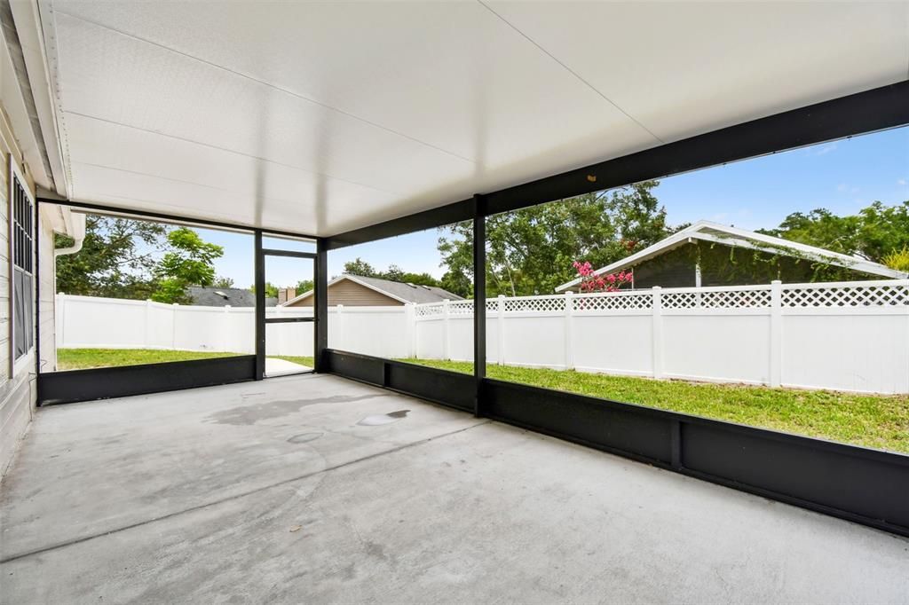 Covered screened back porch.