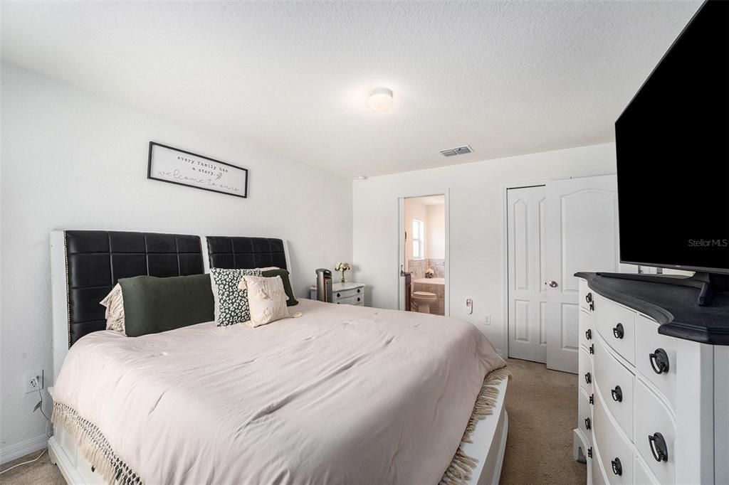 PRIMARY BEDROOM WITH ENSUITE BATH