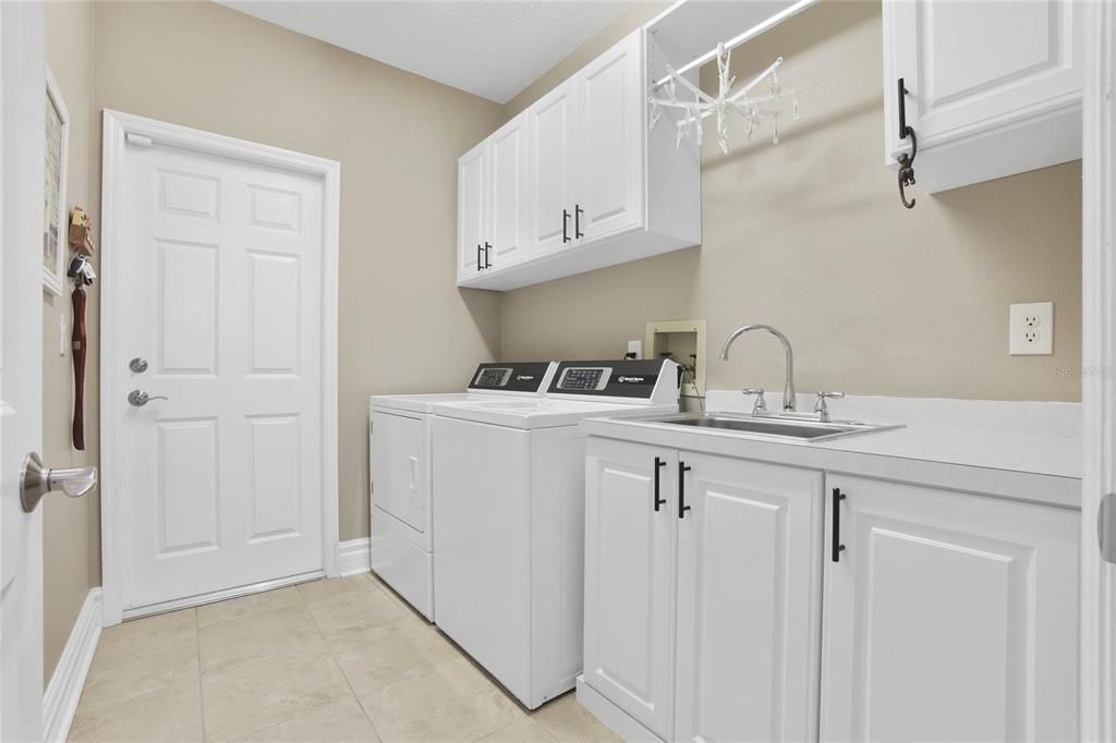 Laundry Room with shelving and sink