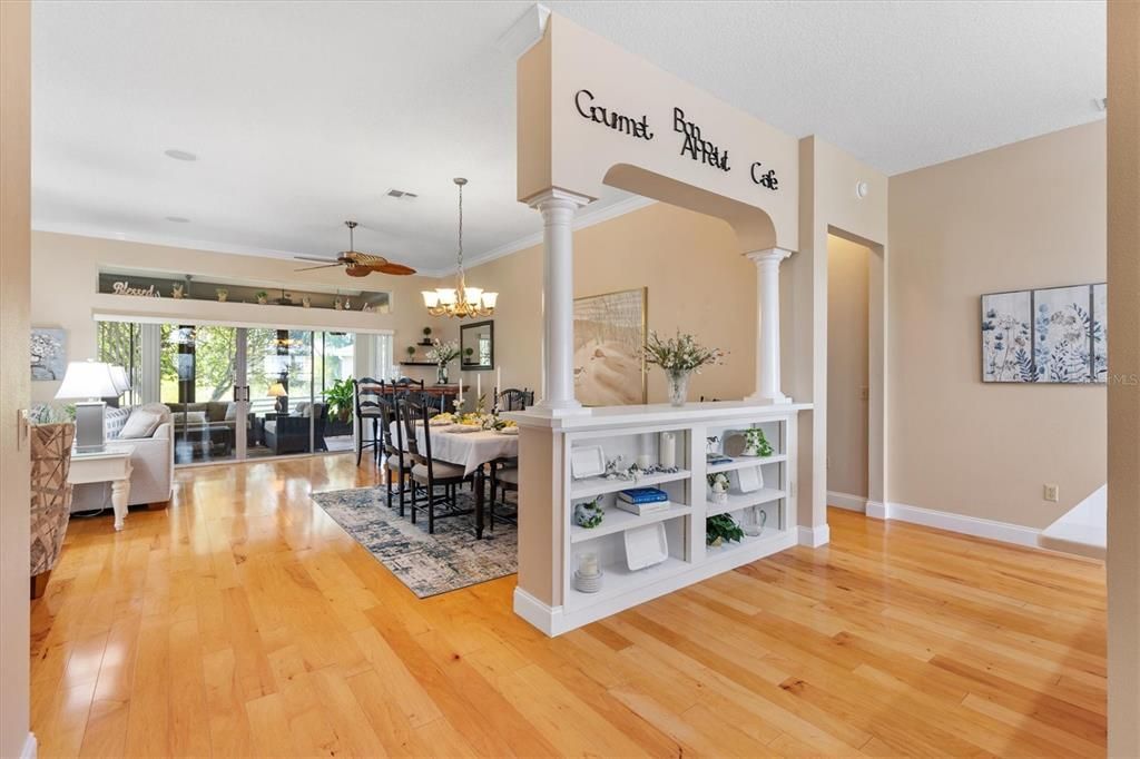 A look at the large area from the foyer to the sliding door walls out to the lanai.