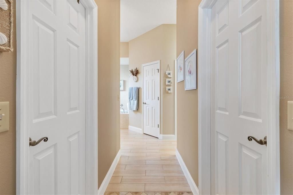 Master bedroom to the bathroom.