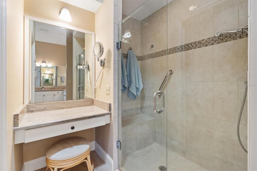 Master bedroom with shower and vanity space.