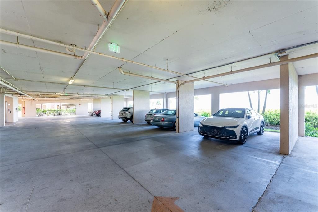 Looking west in underbuilding parking area