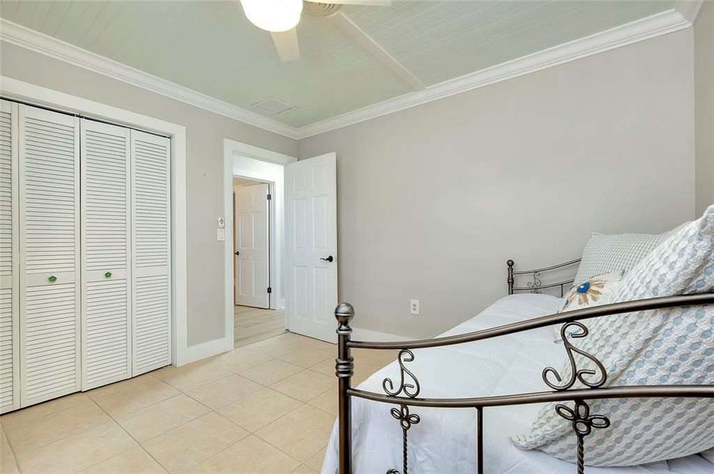 Guest bedroom - large double door closet.