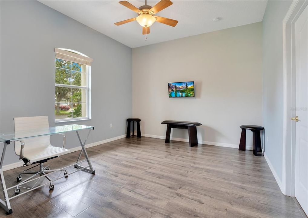 Den/Flex Room With Direct Access to Primary Bedroom and Entry Foyer