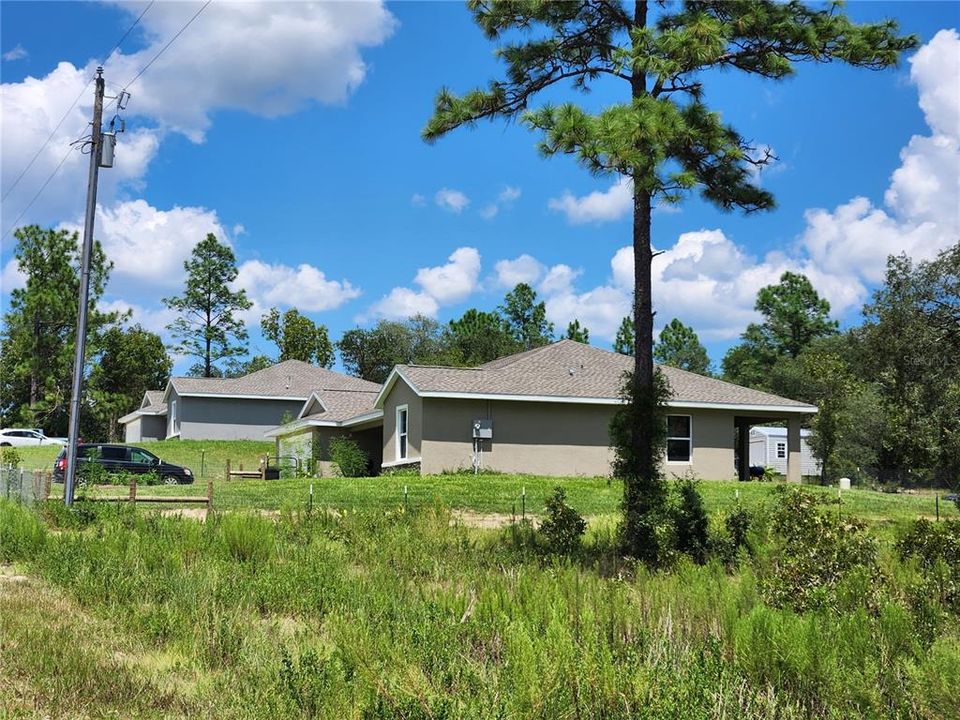 HOUSES TO THE NORTH, ONE VACANT LOT BETWEEN