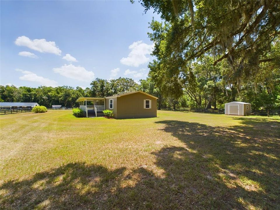 Way to barn and paddocks, with storage space in the back