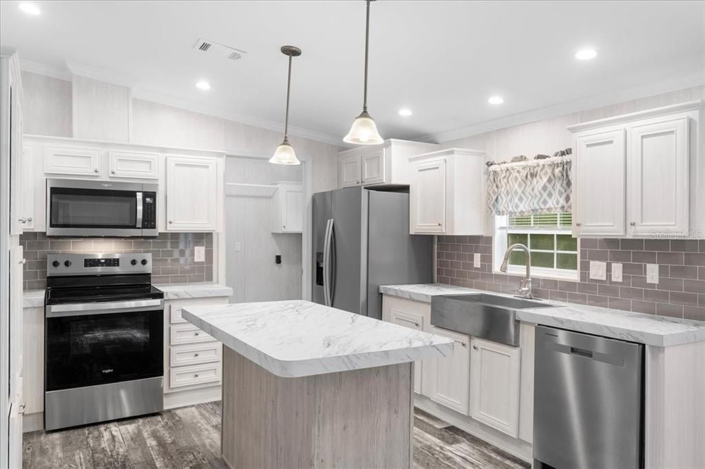 Kitchen w/Stainless Steel Appliances & Island