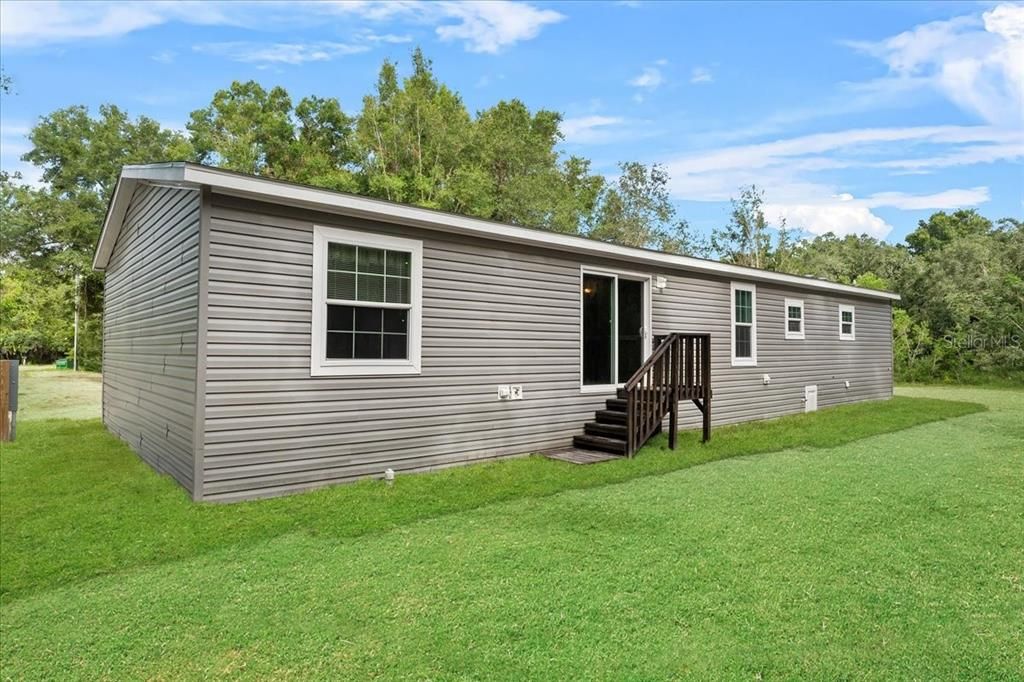 Rear Left of Home w/Sliding Glass Door for Rear Entry