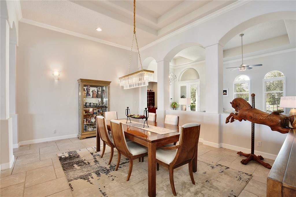 (15'X16') Formal Dining Room--Beautiful lake views and coffered ceilings adorn this elegant inviting space.