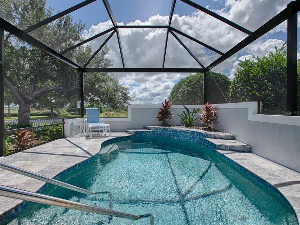 NEW SALT-WATER HEATED POOL RECENTLY ADDED WITH TRAVERTINE DECKING AND PRIVACY!