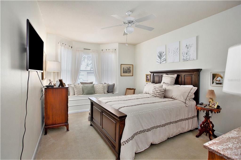 master bedroom with window sun seat and HUGE walk in closet