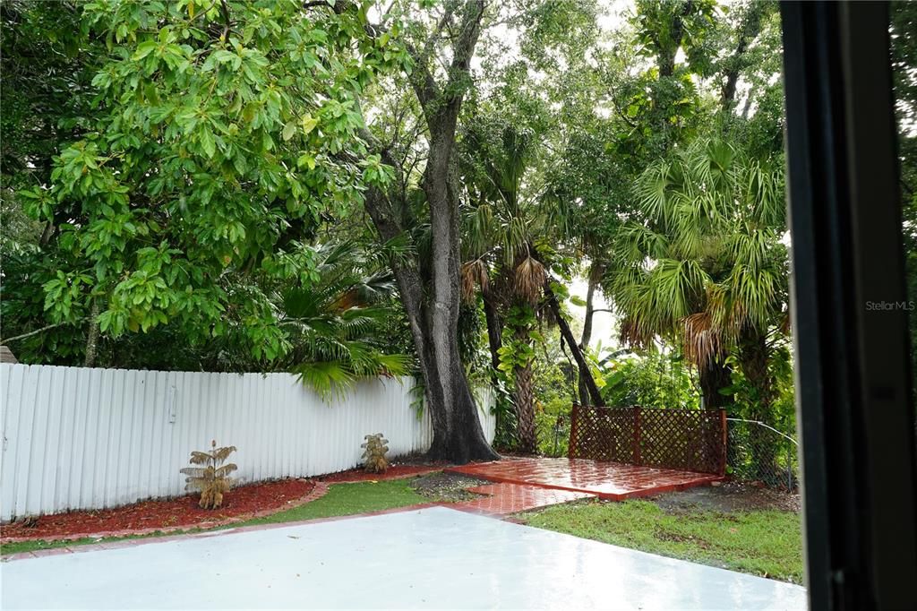 terraza and patio view with 2 storage shed