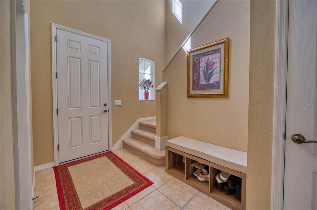 Foyer leading to upstairs and great room