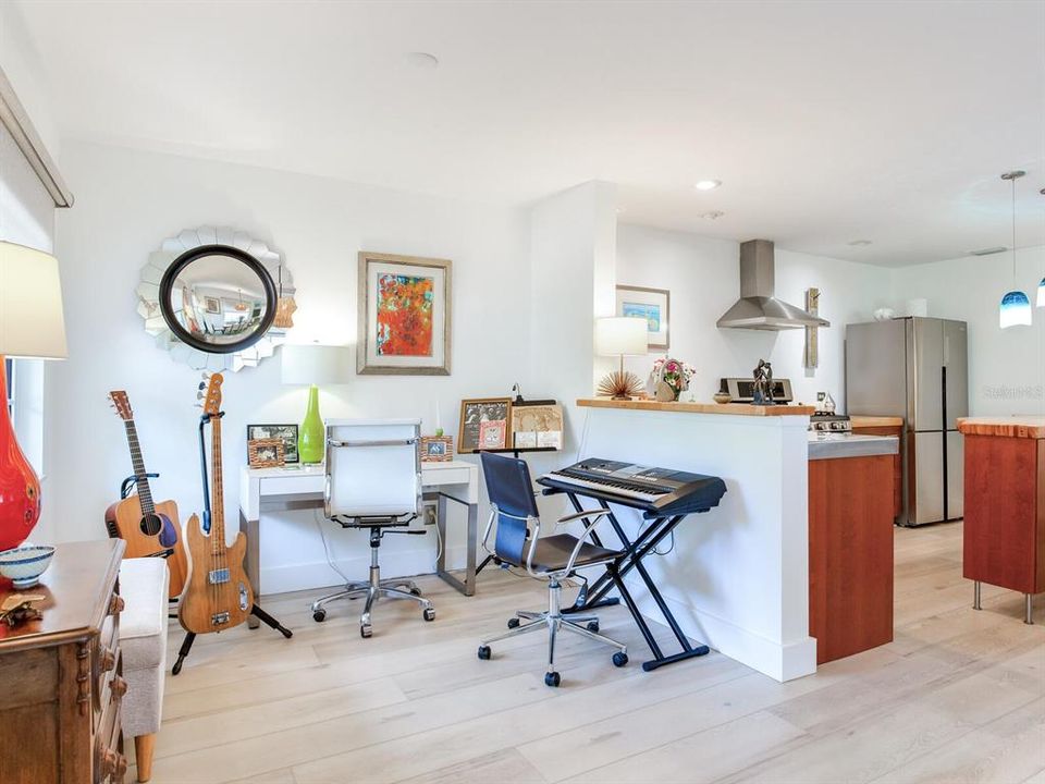 Music room area, or separate sitting area, located at front of home.