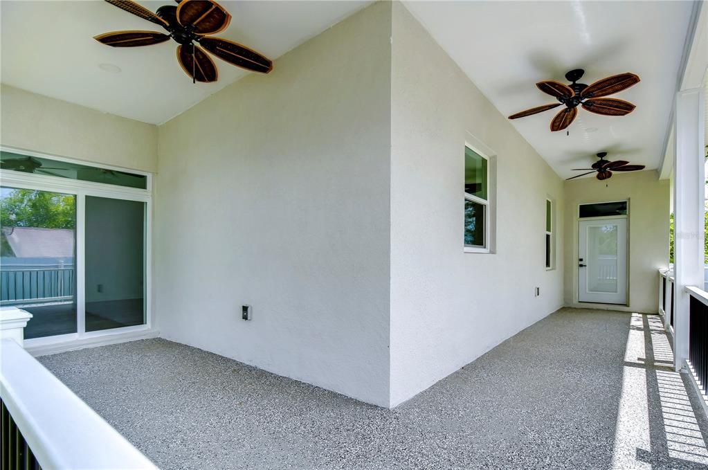 Primary Bedroom access thru the sliders. Kitchen access thru the single door.