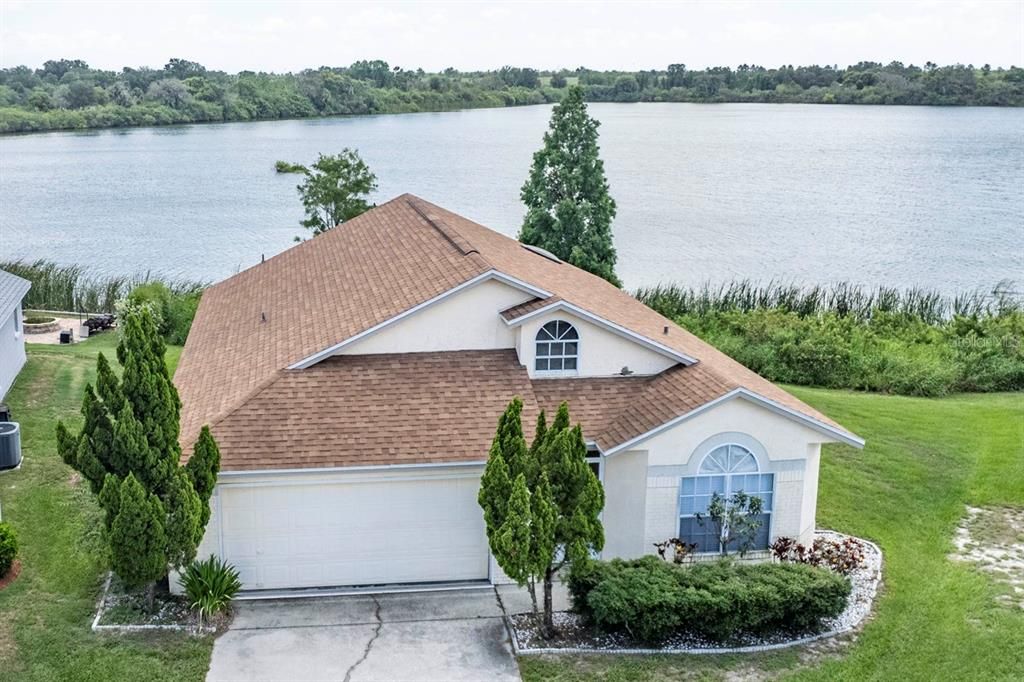 Front of the home directly on the lake.