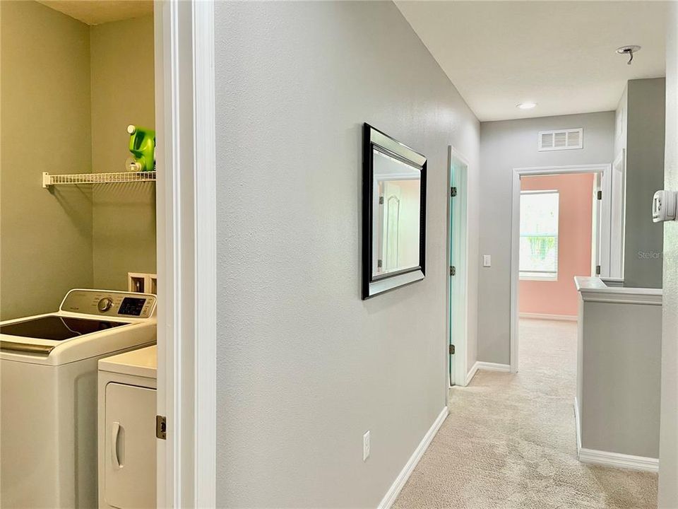 Hallway to front Bedrooms - Separate bathroom on the left.