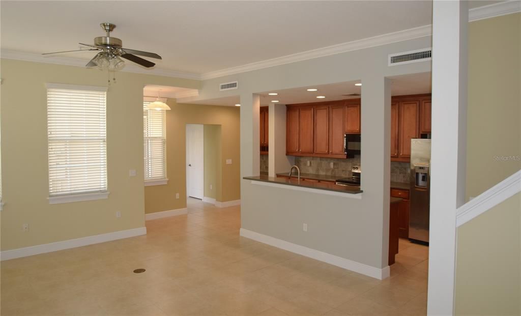 Kitchen with Dining Nook at Entry Fm Attached Garage