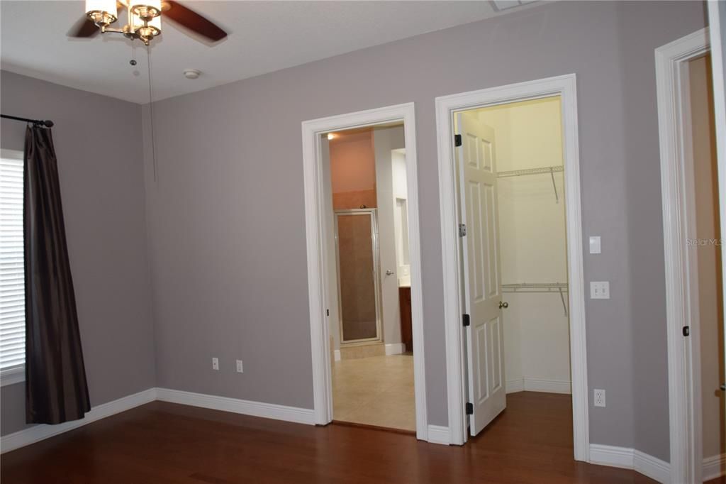 Primary Bedroom With Two Walk-In Closets