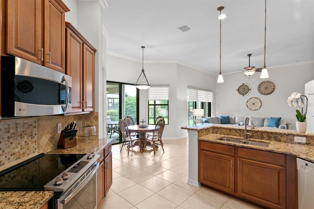 Thick granite counters & tiled backsplash