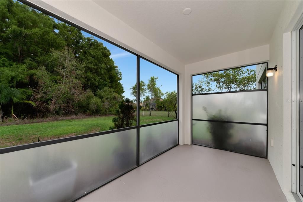 screened lanai, preserve view.  space for a pool