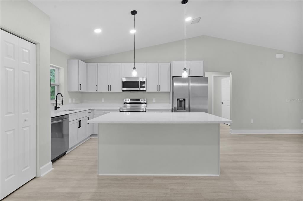 Wonderful kitchen design with island and breakfast bar