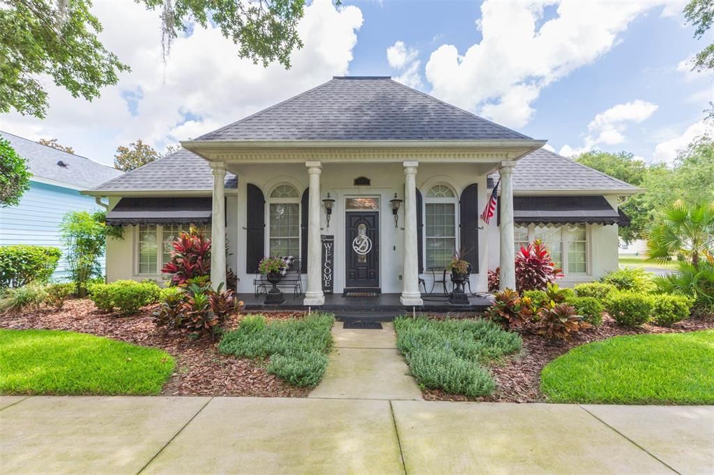 Stunning exterior with gracious columns and relaxing front porch