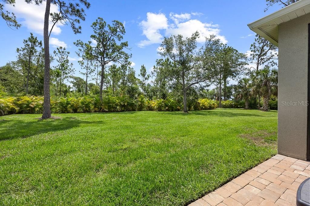 Over an acre of lush green yard and landscaping